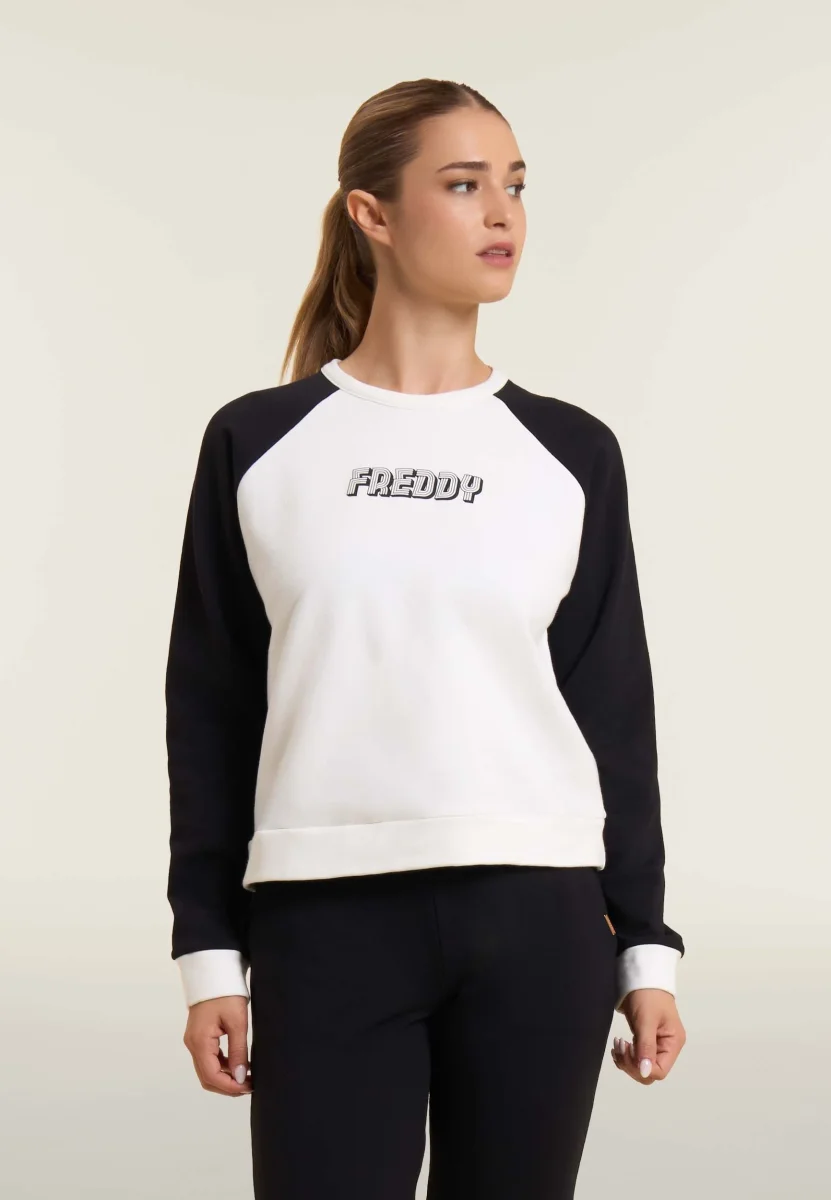 Felpa cropped bicolore con maniche raglan