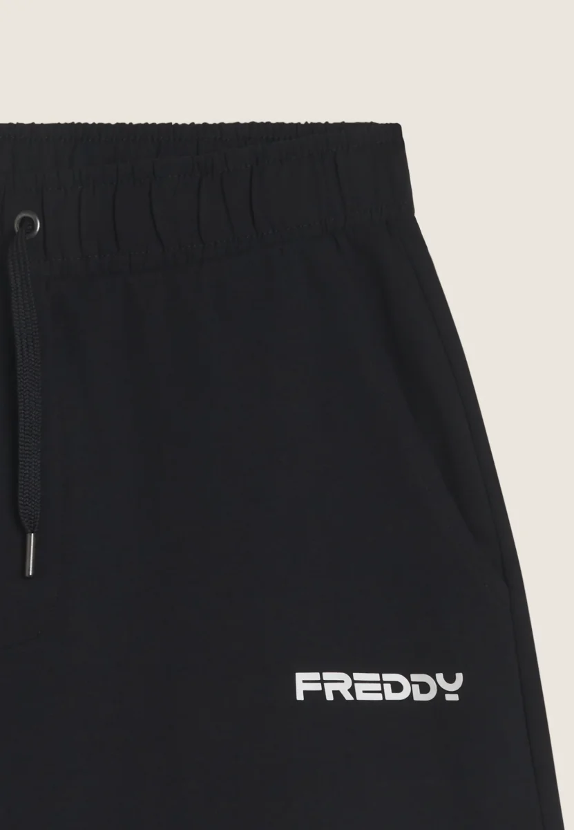 Pantaloni corti a metà coscia in jersey stretch – Bild 7