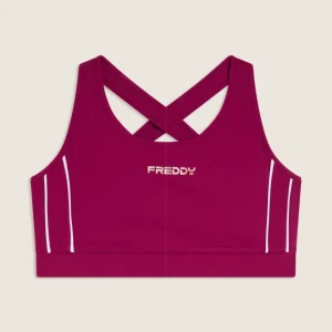 Top medio supporto in jersey tecnico con spalline incrociate